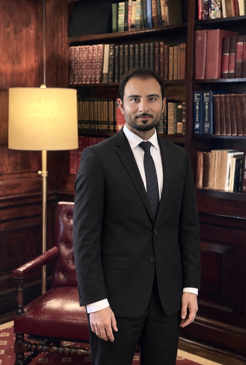 Yahya Qanie in a library